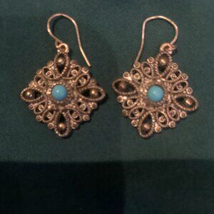 Turquoise dangling earrings.